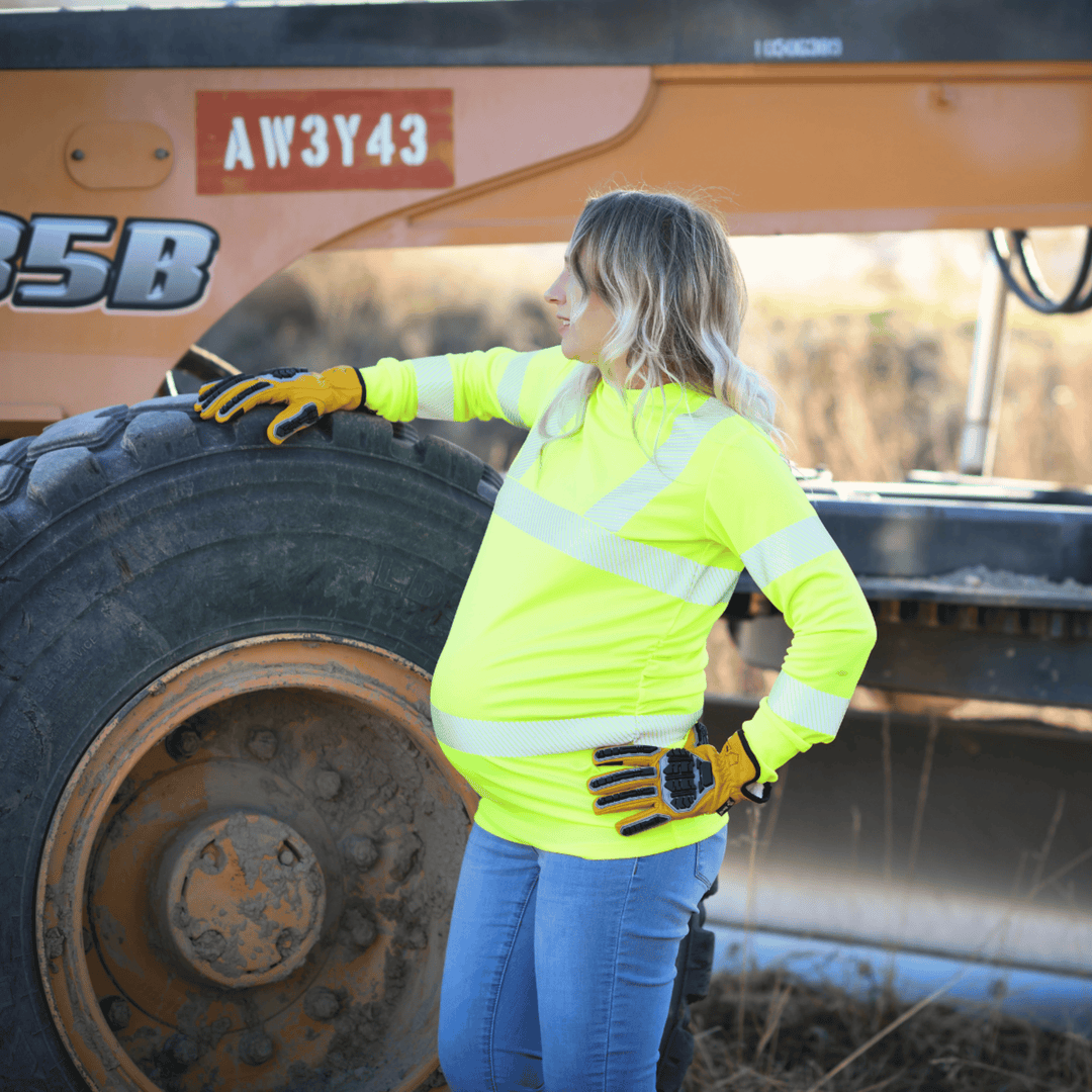 Properly fitted ANSI Class 2 Type R high-visibility maternity PPE shirt designed to accommodate pregnancy while maintaining safe range of motion and visibility compliance