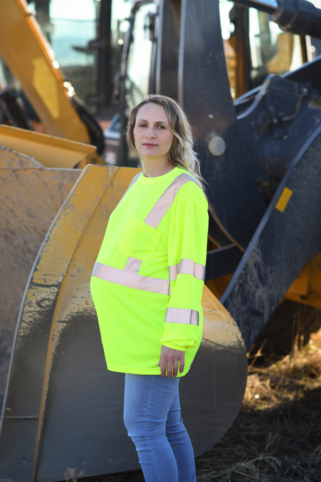 zed-up standard PPE failing to fit pregnant worker properly, causing excess bulk in some areas and restriction in others